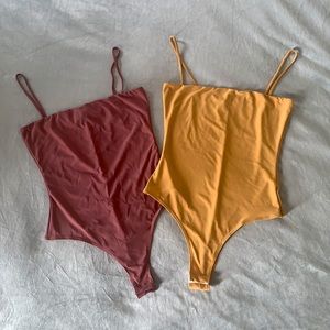 Bundle of two bodysuit.